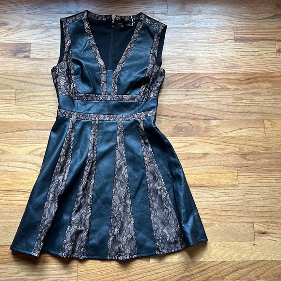 Bcbg dress with details in leather and lace Bcbg dress with details in leather and lace